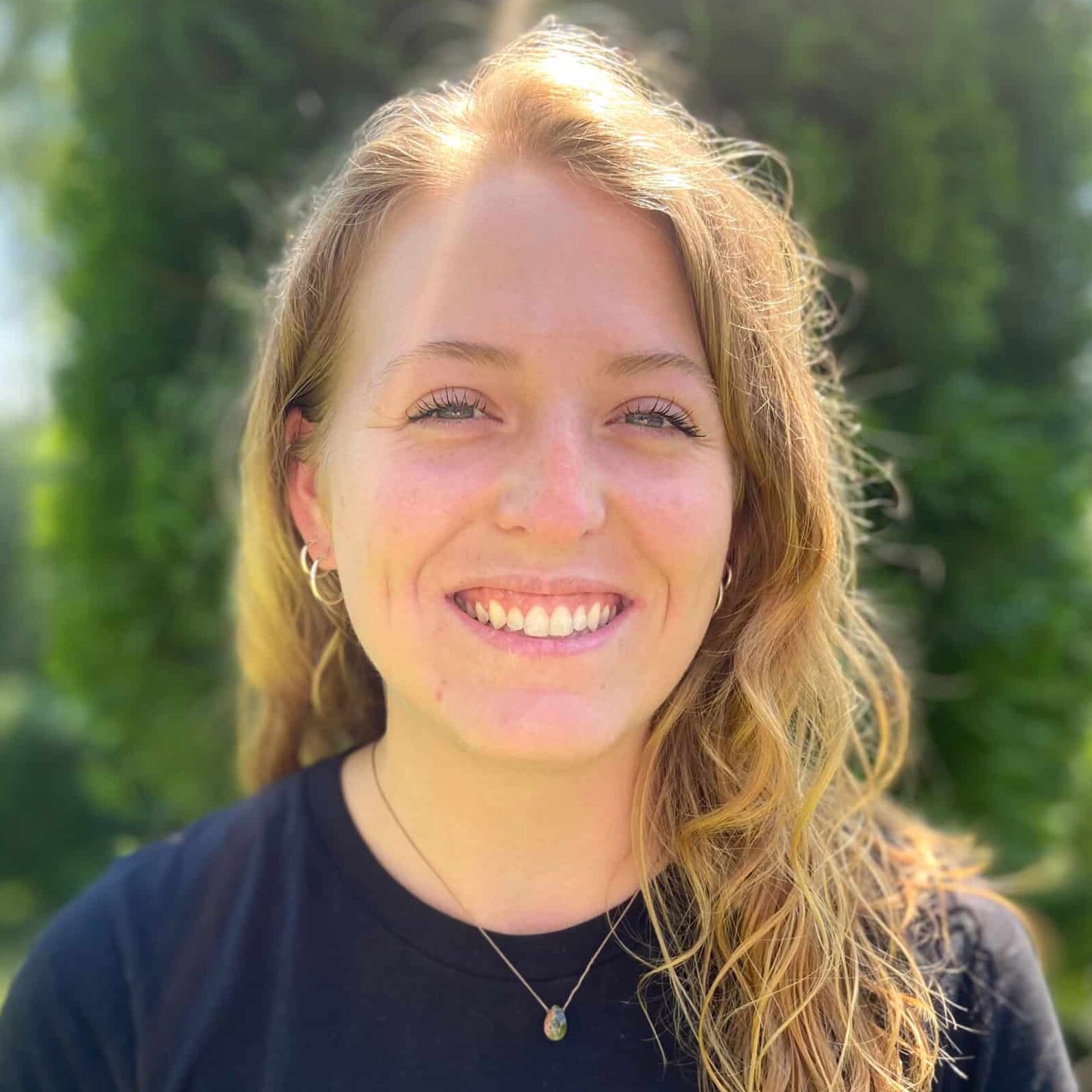 Skyterra Young Adult residential coordinator pictured outside on campus